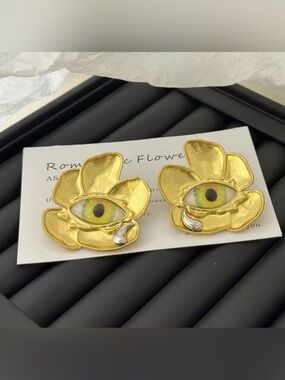 Schiaparelli Inspired Gold Flower Eye Statement Earrings